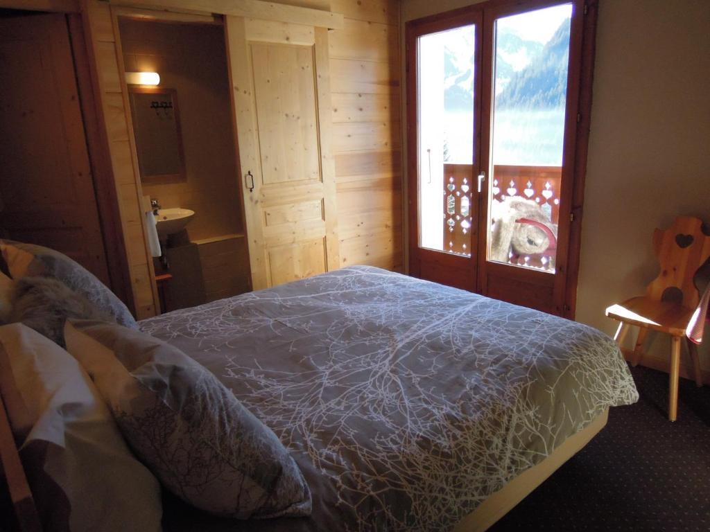 Le Roitelet Hotel Châtel Værelse billede